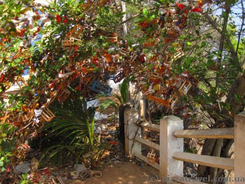 Different things hang on trees in temples.