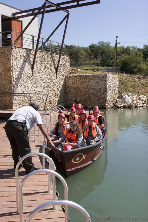 You can leave the cave in a boat.