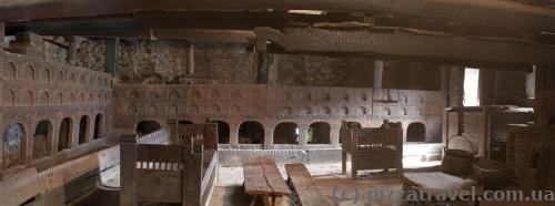 Arches along the walls are for livestock, which was used as living 