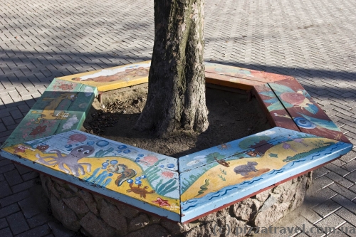 Children painted the benches in the park.