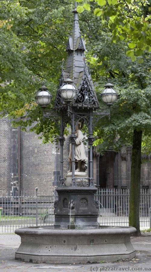 Fountain near the bell tower of St. Nicholas Church